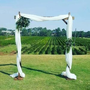 Rustic Wooden Arbour with Chiffon Draping